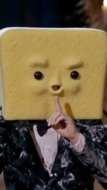 Sponge dancer, starfish onlooker. Tip toeing in my Jordans meme example: a square yellow sponge character shushing the camera